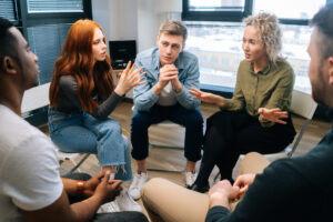 a group of people participate in one of the addiction therapy programs missouri 