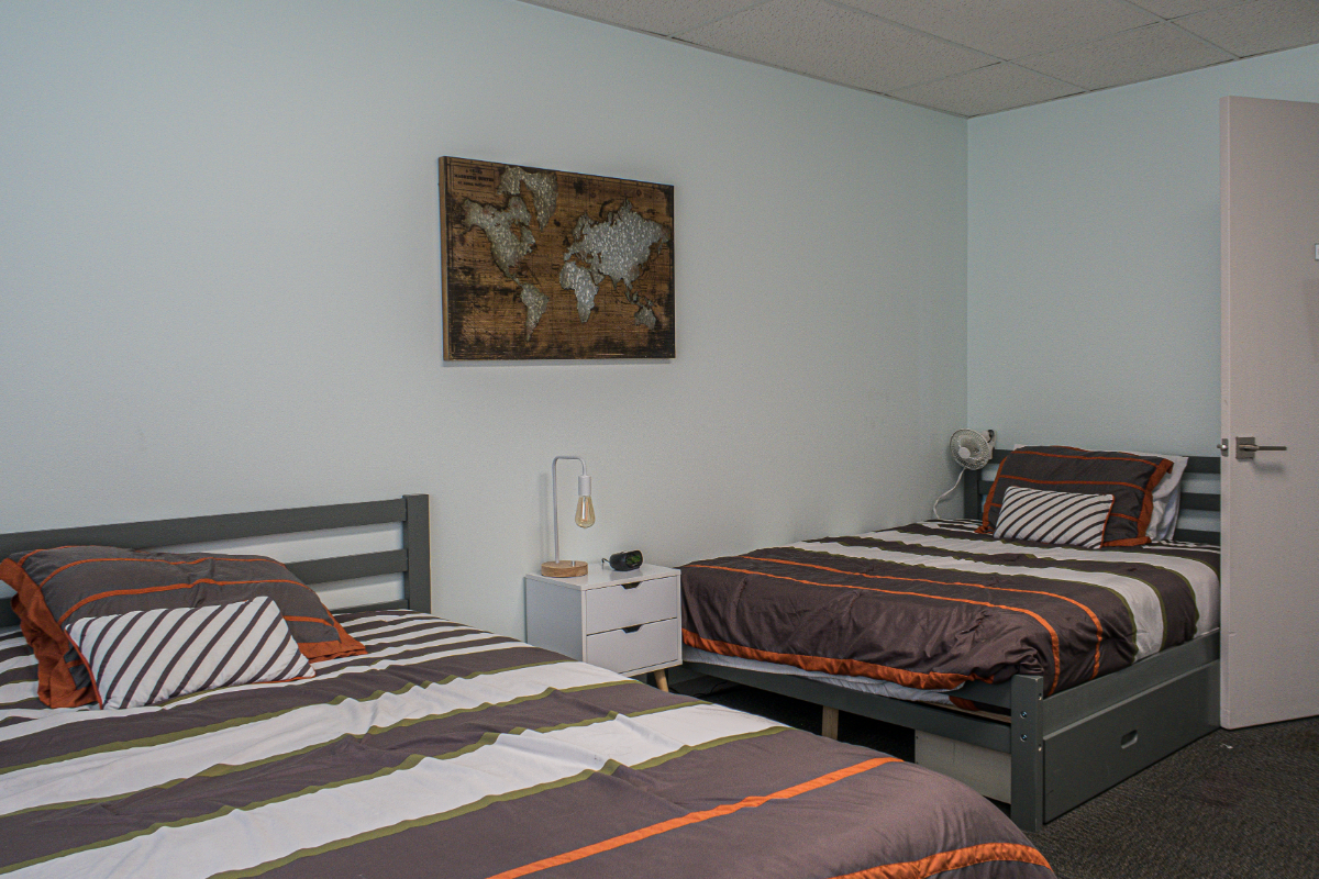 a two bed room at denovo recovery an addiction treatment program in missouri